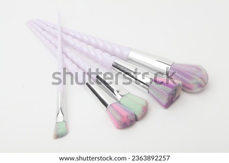 Makeup brushes
Cosmetic applicators
Beauty tools
Brush set
Makeup artist essentials
Precision application
Cosmetic bristles
Foundation blending
Eye shadow brushes
Professional makeup brushes Royalty-Free Stock Photo #2363892257