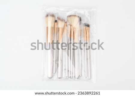 Makeup brushes
Cosmetic applicators
Beauty tools
Brush set
Makeup artist essentials
Precision application
Cosmetic bristles
Foundation blending
Eye shadow brushes
Professional makeup brushes Royalty-Free Stock Photo #2363892261