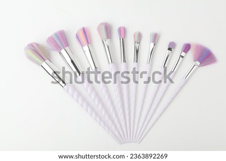 Makeup brushes
Cosmetic applicators
Beauty tools
Brush set
Makeup artist essentials
Precision application
Cosmetic bristles
Foundation blending
Eye shadow brushes
Professional makeup brushes Royalty-Free Stock Photo #2363892269