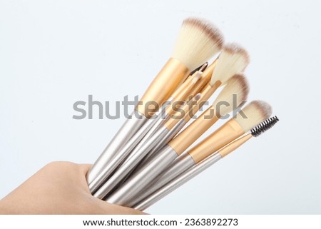 Makeup brushes
Cosmetic applicators
Beauty tools
Brush set
Makeup artist essentials
Precision application
Cosmetic bristles
Foundation blending
Eye shadow brushes
Professional makeup brushes Royalty-Free Stock Photo #2363892273