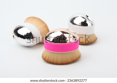 Makeup brushes
Cosmetic applicators
Beauty tools
Brush set
Makeup artist essentials
Precision application
Cosmetic bristles
Foundation blending
Eye shadow brushes
Professional makeup brushes Royalty-Free Stock Photo #2363892277