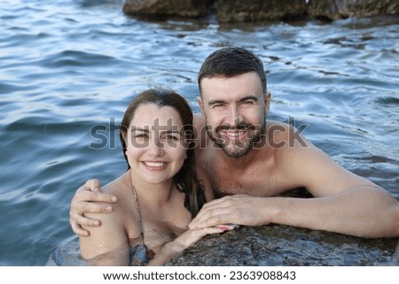Beautiful couple in the water  