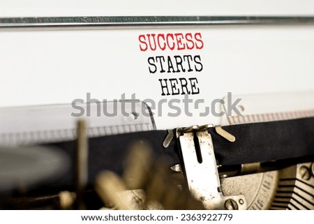 Success starts here symbol. Concept word Success starts here typed on beautiful retro old typewriter. Beautiful white paper background. Business motivational success starts here concept. Copy space.
