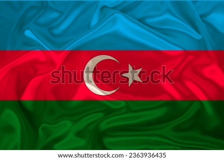 colored national flag represents Azerbaijan's sovereignty and independence as nation on textured fabric, concept unique cultural and political identity, tourism, emigration, economy and politics