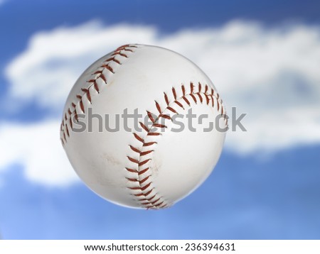 Softball flying thru the sky