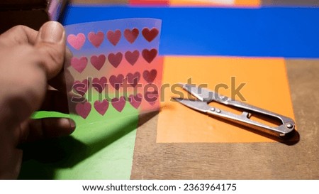 Sticker texture hearts. Transparent material. Do-it-yourself creativity. Interesting sticker.