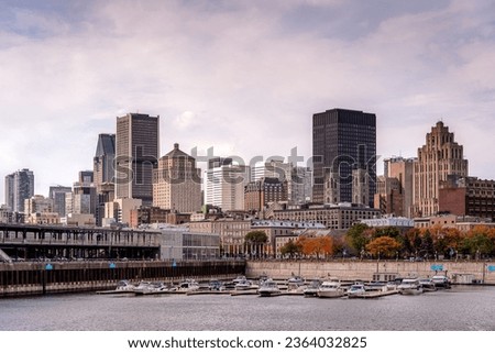 This photo of the old city and Montreal Downtown was taken from the old port at fall season. 