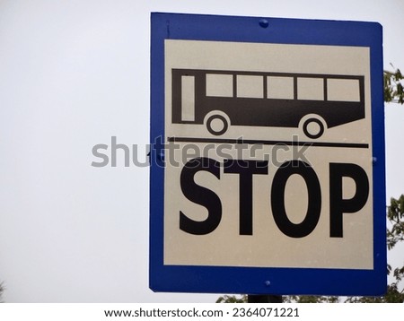 traffic signs to indicate where the bus stops. 