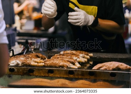 One of the delicious street food dish at the Dongmun Night Market.This is one of Jeju famous tourist spot. Royalty-Free Stock Photo #2364073335