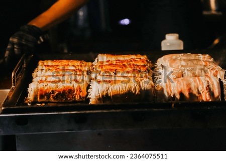 One of the delicious street food dish at the Dongmun Night Market.This is one of Jeju famous tourist spot. Royalty-Free Stock Photo #2364075511
