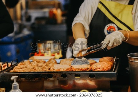One of the delicious street food dish at the Dongmun Night Market.This is one of Jeju famous tourist spot. Royalty-Free Stock Photo #2364076025