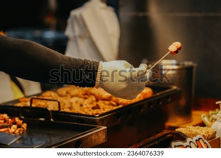 One of the delicious street food dish at the Dongmun Night Market.This is one of Jeju famous tourist spot. Royalty-Free Stock Photo #2364076339