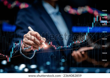 Businesswomen touch virtual screens of index graphs stock market changes, uptrends, growth economy, investor business strategy development, valuation take profit point, opportunities for investment. Royalty-Free Stock Photo #2364082859