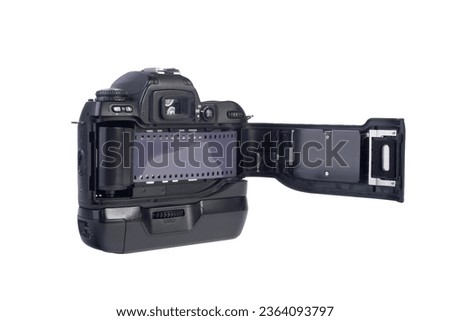a reflex camera with film inserted on a transparent background Royalty-Free Stock Photo #2364093797