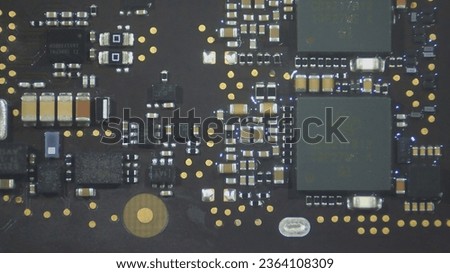 Close up picture of logic board and its silicon chipsets. 