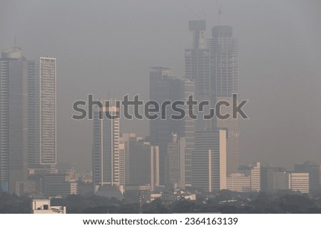 Jakarta, Indonesia - September 20, 2023: Air pollution in Jakarta, the capital city of Indonesia. Royalty-Free Stock Photo #2364163139