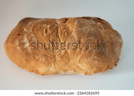 Homemade sourdough bread on white background. Sourdough bread isolated on white background, side photo.
