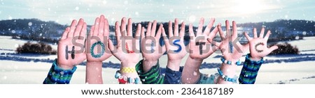 Children Hands Building Colorful English Word Holistic. White Winter Background With Snowflakes And Snowy Landscape.
