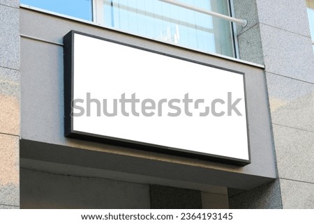 Blank white store sign design mockup. Street storefront shop, cafe, restaurant light box signboard mock up design template.