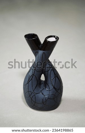 Beautiful ceramic flower vase on white background