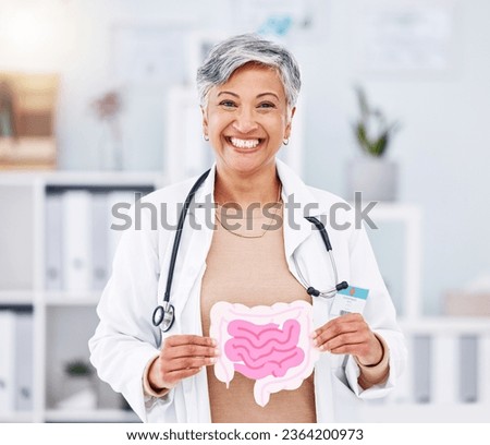 Portrait, doctor and mature woman with intestine model in hospital clinic. Face, gastroenterology and medical professional smile for healthcare of gut, wellness of digestive system and colon anatomy