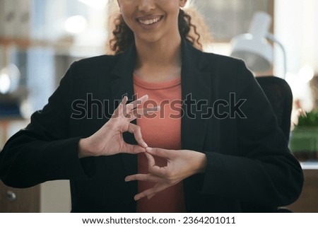Hand gesture, corporate and woman at work for communication, sign language or working. Smile, office and employee, person or worker gesturing for conversation, talking or connection in the workplace
