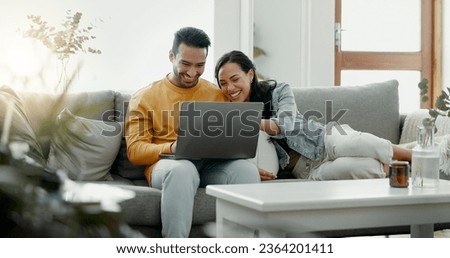 Couple, laptop and laugh on sofa in home for meme, watch movies and streaming funny multimedia. Happy man, woman and relax at computer in living room on social media, web subscription or comedy show Royalty-Free Stock Photo #2364201411