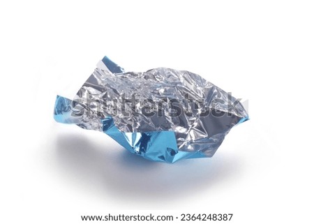 candy blue wrapper empty and open isolated on white background with copy space for your text Royalty-Free Stock Photo #2364248387