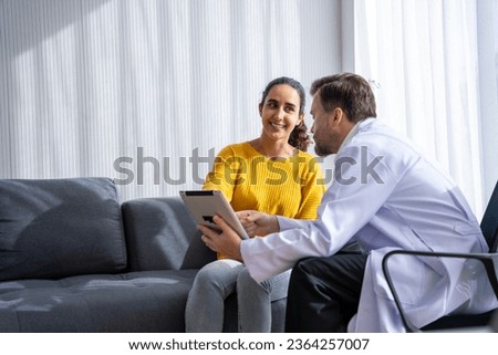 male  doctor and Female patient Talk and give advice about the illnesses of patients in the hospital