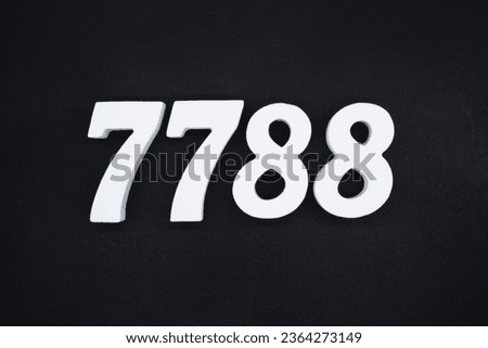 Black for the background. The number 7788 is made of white painted wood.