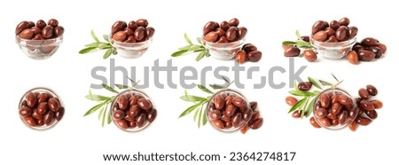 Delicious red olives isolated on white background. Marinated olives in a bowl. Delicious olives. Close-up. Vegan.