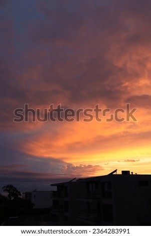 Orange clouds. Beautiful sunset over the ocean