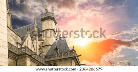 Great gothic church of Saint Germain l Auxerrois (against the background of a sky at sunset), Paris, France   