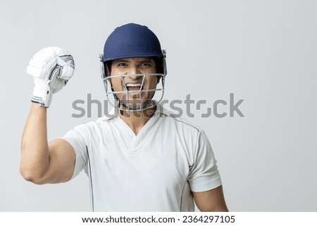 Cricketer in full Joy expression screaming towards the camera, Man in cricket dress screaming in joy and celebrating victory