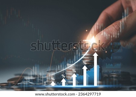 Interest rate and dividend concept. Businessman with percentage symbol and up arrow, Interest rates continue to increase, return on stocks and mutual funds, long term investment for retirement. Royalty-Free Stock Photo #2364297719