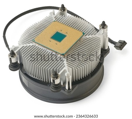 close-up of cpu stuck to cooler heatsink isolated on white background, difficult to separate the cpu or processor from the cooler due to hardened thermal paste, computer repair and service concept Royalty-Free Stock Photo #2364326633