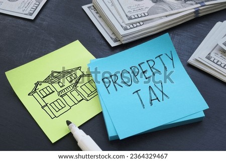Property tax is shown using a text and photo of dollars and picture of house