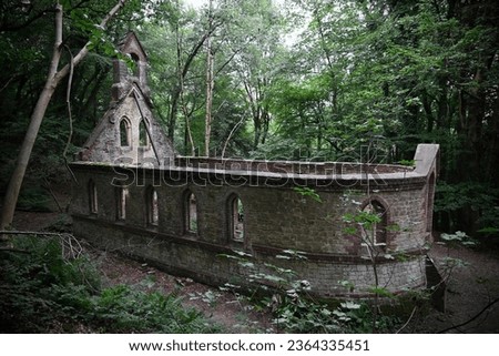 Creepy abandoned church deep in the woods Royalty-Free Stock Photo #2364335451