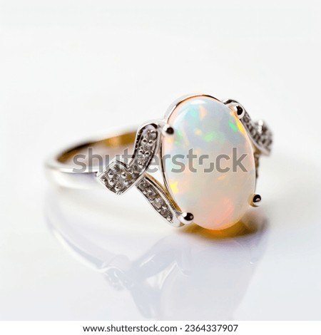 A beautiful white opal ring isolated on a white background.