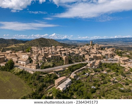 This is an aerial drone shot of Sos del Rey Catolico. a small spanish village on top of a mountain in the province of Aragon. Royalty-Free Stock Photo #2364345173