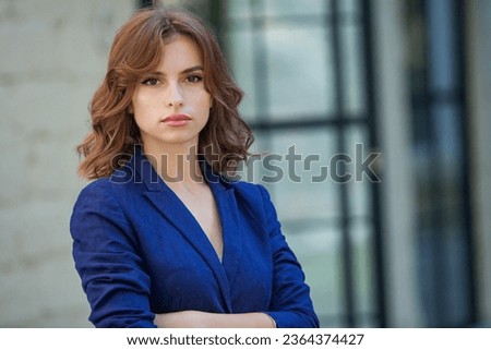 Young confident smiling Asian business woman leader, successful entrepreneur, elegant professional company executive ceo manager, wearing suit standing in office. Royalty-Free Stock Photo #2364374427