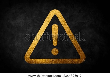 Yellow and Golden hazard warning attention sign with exclamation mark symbol on black background. Royalty-Free Stock Photo #2364395019