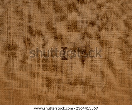 Letter I. Stamp letters on linen fabric