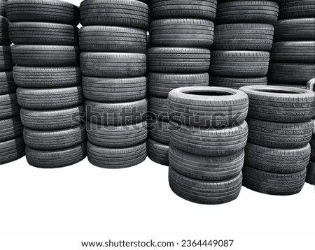 Old used tires are piled high  isolated on white background. Royalty-Free Stock Photo #2364449087