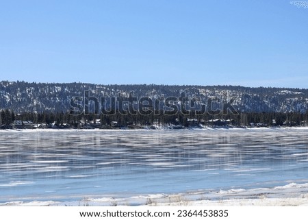 Big Bear Lake water with icy during the winter in the San Bernardino Mountains in southern California.
