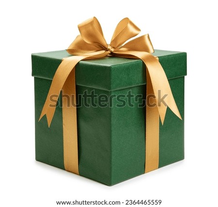 green gift box wrapped with gold bow and ribbon isolated on white background. Royalty-Free Stock Photo #2364465559