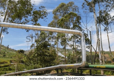 big metal pipe, tubes for hot steam in nature. Uap Panas translates to Hot Steam in Bahasa Indonesia