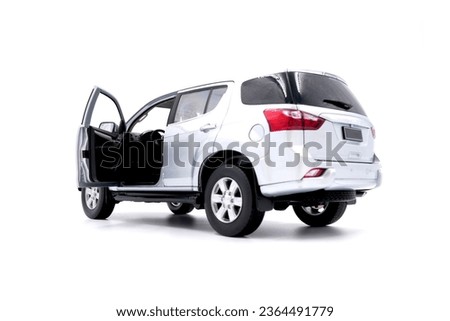 isolated simple and metallic suv car on white background back view with the open back door Royalty-Free Stock Photo #2364491779