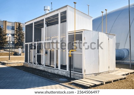Inflatable air dome stadium. Inflated Football soccer air dome. Modern architecture example pneumatic stadium dome with natural gas heat generators, hot air blower and air conditioning system. Royalty-Free Stock Photo #2364506497