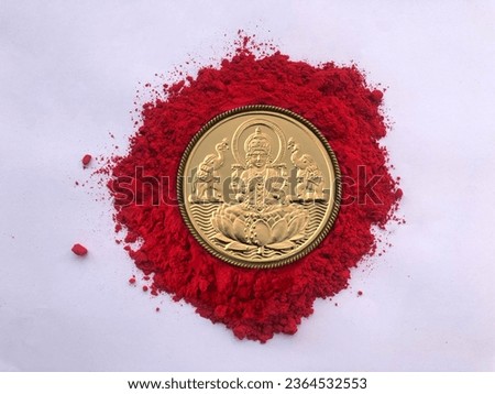 image of Laxmi Coin in Kumkum Royalty-Free Stock Photo #2364532553